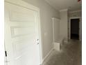 Welcoming entryway with a built-in bench and coat rack, providing a cozy feel at 76 Royal Ave, Selma, NC 27576