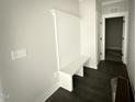 Mudroom featuring coat rack and seat at 76 Royal Ave, Selma, NC 27576