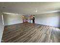 Expansive living room featuring hardwood floors and an open layout at 8 W Emily Gardens Dr, Selma, NC 27576