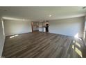 Spacious living room with hardwood flooring and natural light, perfect for entertaining and relaxing at 8 W Emily Gardens Dr, Selma, NC 27576