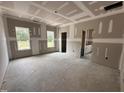 Unfinished bedroom featuring natural light from two windows at 87 Tee Dr, Selma, NC 27576