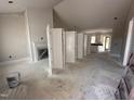 Spacious living room featuring a fireplace with white shiplap and open layout at 87 Tee Dr, Selma, NC 27576