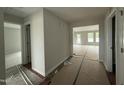 Bright entryway showcasing open floor plan leading to the living area and bedrooms at 89 W Emily Gardens Dr, Selma, NC 27576