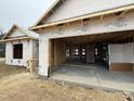 Attached two-car garage of new construction with a concrete floor at 89 W Emily Gardens Dr, Selma, NC 27576