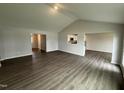 Spacious living area showcasing an open layout and modern flooring throughout at 89 W Emily Gardens Dr, Selma, NC 27576