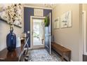 Inviting home entryway features stylish decor, patterned rug, and a welcoming ambiance at 1005 Vesper Ct, Durham, NC 27703