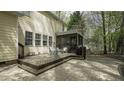 Outdoor deck featuring outdoor seating with a grill, perfect for entertaining or unwinding in the backyard at 1505 Starmont Dr, Hillsborough, NC 27278