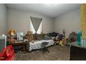 Comfortable living room with neutral tones, featuring wood-look flooring and plenty of space for seating at 257 E Raleigh Blvd, Rocky Mount, NC 27801