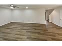 Spacious living room with hardwood flooring and natural light, ideal for entertaining and Gathering gatherings at 400 Collington Dr, Mebane, NC 27302