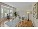 This home office boasts hardwood floors, neutral paint, and ample natural light at 4709 Knights Arm Dr, Durham, NC 27707