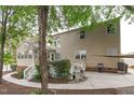 The home features a spacious backyard with a patio, grill, and multi-level deck at 1008 Double Spring Ct, Apex, NC 27502