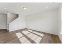 Inviting living room with sleek, light-colored floors, creating a spacious feel at 1431 Goldsboro Ave, Sanford, NC 27330