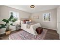 Calm bedroom filled with natural light from large window and hardwood floors at 5013 Green Oak Dr, Durham, NC 27712