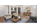 Open-concept living area seamlessly connects the dining and kitchen spaces, ideal for entertaining at 548 Folk Song Way, Wendell, NC 27591
