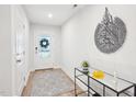 Inviting entryway with stylish decor and ample natural light at 1003 Canary Pepper Dr, Durham, NC 27713