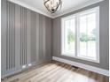 Bright office featuring shiplap accent wall, recessed lighting, and large double-hung windows at 1029 Azalea Garden Cir, Raleigh, NC 27603