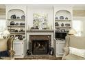 Close-up of the living room fireplace and built-ins for a warm, inviting aesthetic at 228 Old Colony Way, Rocky Mount, NC 27804