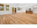 Open floor plan features a combined kitchen and living area with a sliding glass door to the back porch at 42 Ponchartrain St, Fuquay Varina, NC 27526