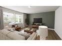 Comfortable living room with large windows, plush seating, and modern decor at 520 Folk Song Way, Wendell, NC 27591