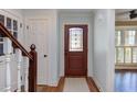 Cozy entryway featuring a stained glass front door and hardwood floors at 111 Fox View Pl, Cary, NC 27511