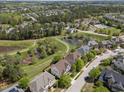 Wonderful neighborhood featuring charming homes, walking trails, lush greenery, ponds, and community pool at 224 Clear River Pl, Cary, NC 27519