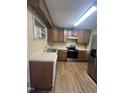 Functional kitchen showcasing laminate countertops and stainless steel appliances at 327 Holland Dr Rd, Smithfield, NC 27577