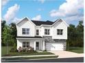 Charming two-story home with stone accents and a two-car garage at 705 Compeer Way # 31, Rolesville, NC 27571