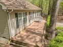 Spacious brick patio with privacy fence, perfect for outdoor entertaining or relaxing at 922 Royal Oaks Dr, Durham, NC 27712