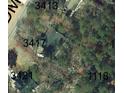Aerial view of property outline with address numbers at 3417 Windmere Dr, Sanford, NC 27330