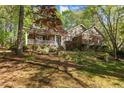 Beautiful brick home with covered porch and well-maintained landscaping at 3417 Windmere Dr, Sanford, NC 27330