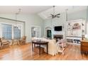 Bright and airy living room with hardwood floors, a fireplace, and a vaulted ceiling at 707 Cross Timbers Dr, Durham, NC 27713