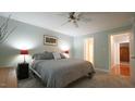 Cozy bedroom featuring neutral tones, a ceiling fan, and carpeted floors at 1415 Quarter Pt, Raleigh, NC 27615