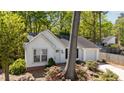 Single-story home with flowers in front yard at 2941 Golden Oak Ct Ct, Raleigh, NC 27603