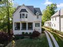 Charming two-story home with landscaped yard and inviting front porch at 3513 Bellevue Rd, Raleigh, NC 27609