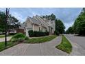Charming home showcasing well-maintained lawn and side entrance at 9531 Vira Dr, Raleigh, NC 27617