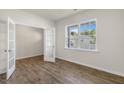 Bright room featuring french doors and a large window with lovely neighborhood views at 125 Pisgah St, Sanford, NC 27330