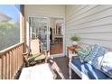 Relaxing screened-in patio with comfortable seating, perfect for enjoying the outdoors in comfort at 1914 Woodsdale Dr, Durham, NC 27703