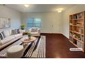 Inviting living room with modern decor, plush seating, and stylish striped rug at 91 Paige Stone Way, Angier, NC 27501
