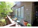 Relaxing porch with seating overlooking lush greenery and neighborhood views at 502 W Poplar Ave # C2, Carrboro, NC 27510