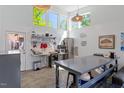 Well-equipped kitchen featuring stainless steel appliances, bright lighting and ample counter space at 545 E Lenoir St, Raleigh, NC 27601