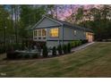 Beautiful backyard featuring a cozy fire pit area, perfect for outdoor entertaining and relaxation at 775 Sagamore Dr, Louisburg, NC 27549