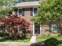 Charming brick townhouse with black shutters and a well-maintained front yard, perfect for suburban living at 3125 Morningside Dr, Raleigh, NC 27607