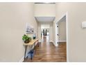 Welcoming foyer with high ceilings, hardwood floors, and natural light filtering through the home at 4228 Nc 42 Hwy, Raleigh, NC 27603