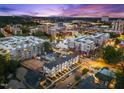Charming residential and retail neighborhood at twilight, perfect for enjoying nearby city conveniences at 700 W North St # 101, Raleigh, NC 27603