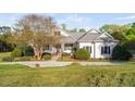 Charming home features manicured landscaping and a welcoming front entrance, perfect for a Gathering or professional at 1601 Dairyland Rd, Chapel Hill, NC 27516