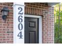 Close-up of the front door with a clear view of the house number, 2604 at 2604 Wyntercrest Ln, Durham, NC 27713