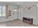 A well-lit entryway with storage and a convenient drop zone, offering functionality and organization at 5604 Bobcat Rd, Chapel Hill, NC 27516