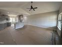 Spacious living area with fireplace open to the kitchen for easy entertaining at 152 Royal Ave, Selma, NC 27576