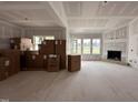 Large living room featuring fireplace, drywall, and natural light at 172 Royal Ave, Selma, NC 27576