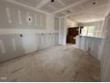 Unfinished dining area featuring large windows for natural light at 192 Royal Ave, Selma, NC 27576